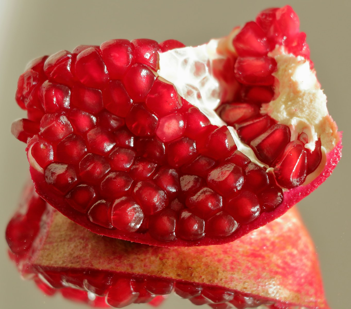 a close up of a pomegranate on a pomegranate